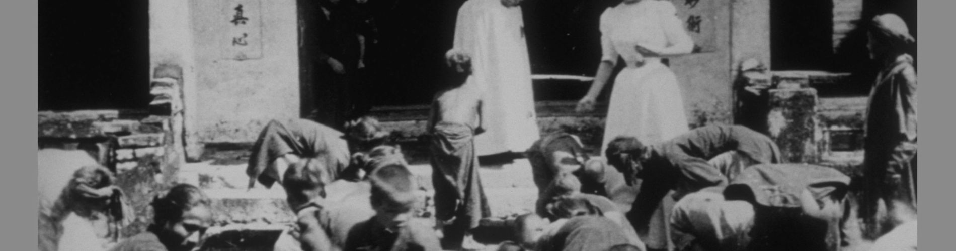 Indochina: Children Gathering Coins Scattered by Western Women