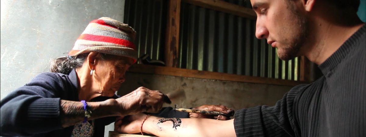 The Woman Behind the Tattoo Artist