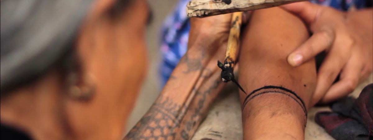 The Woman Behind the Tattoo Artist